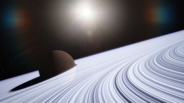 Une vue d'Encélade à travers les anneaux de Saturne